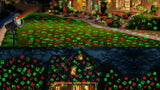 Red and green Christmas projector for a covered patio