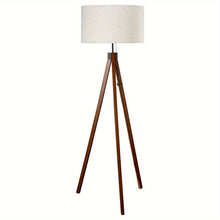 Close-up of linen shade texture and wood tripod joint