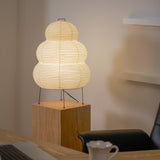 Rice paper lantern table lamp on an entryway console