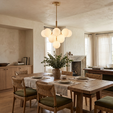Solenne Pendant, brushed gold globe cluster, full fixture on white background