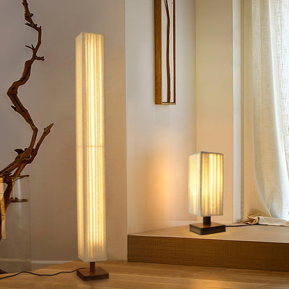 Bailey floor lamp switched on with warm LED glow
