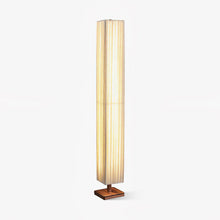 Bailey wood floor lamp with walnut and beige fabric drum shade, front view