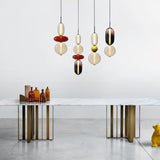 Candied Glass Pendant Light hanging in a living room setting