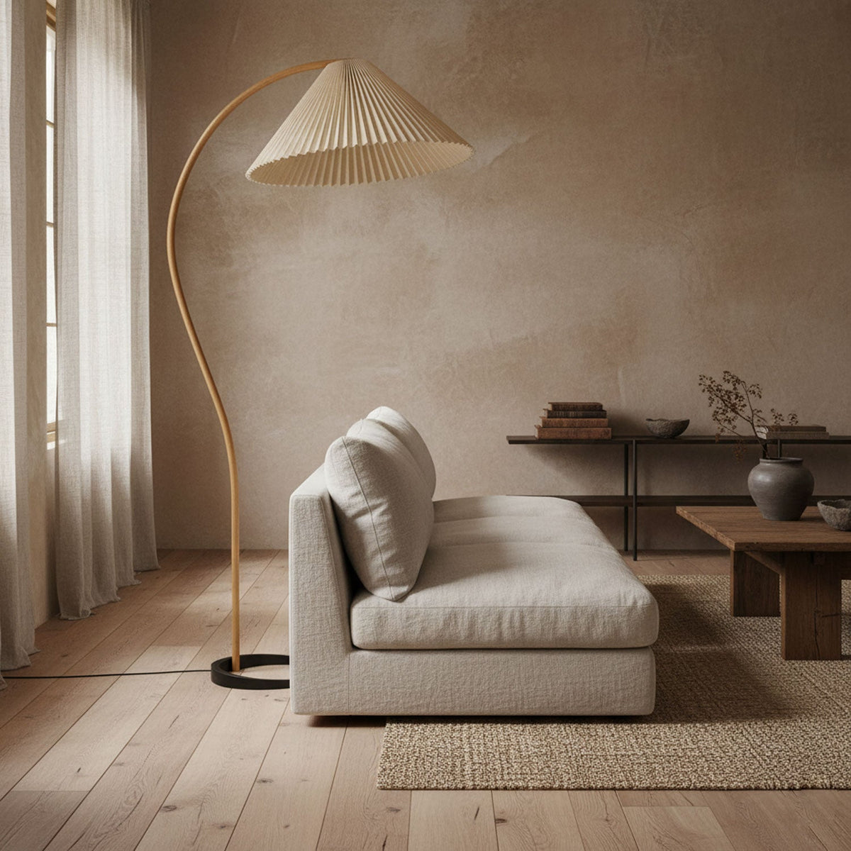 Close-up of the Caprani floor lamp's beechwood stem and metal base
