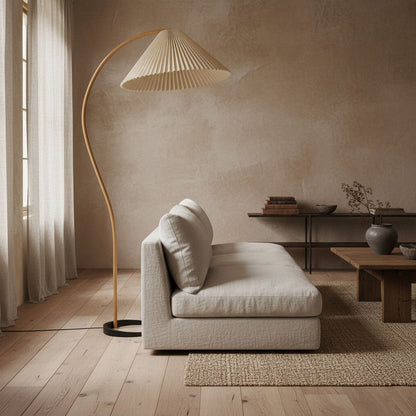 Close-up of the Caprani floor lamp's beechwood stem and metal base