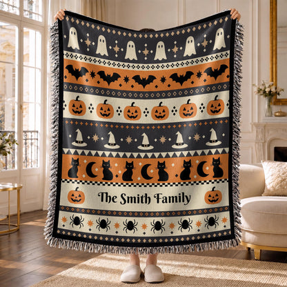 Personalized woven Halloween throw blanket with ghost, bat, pumpkin, and black cat pattern