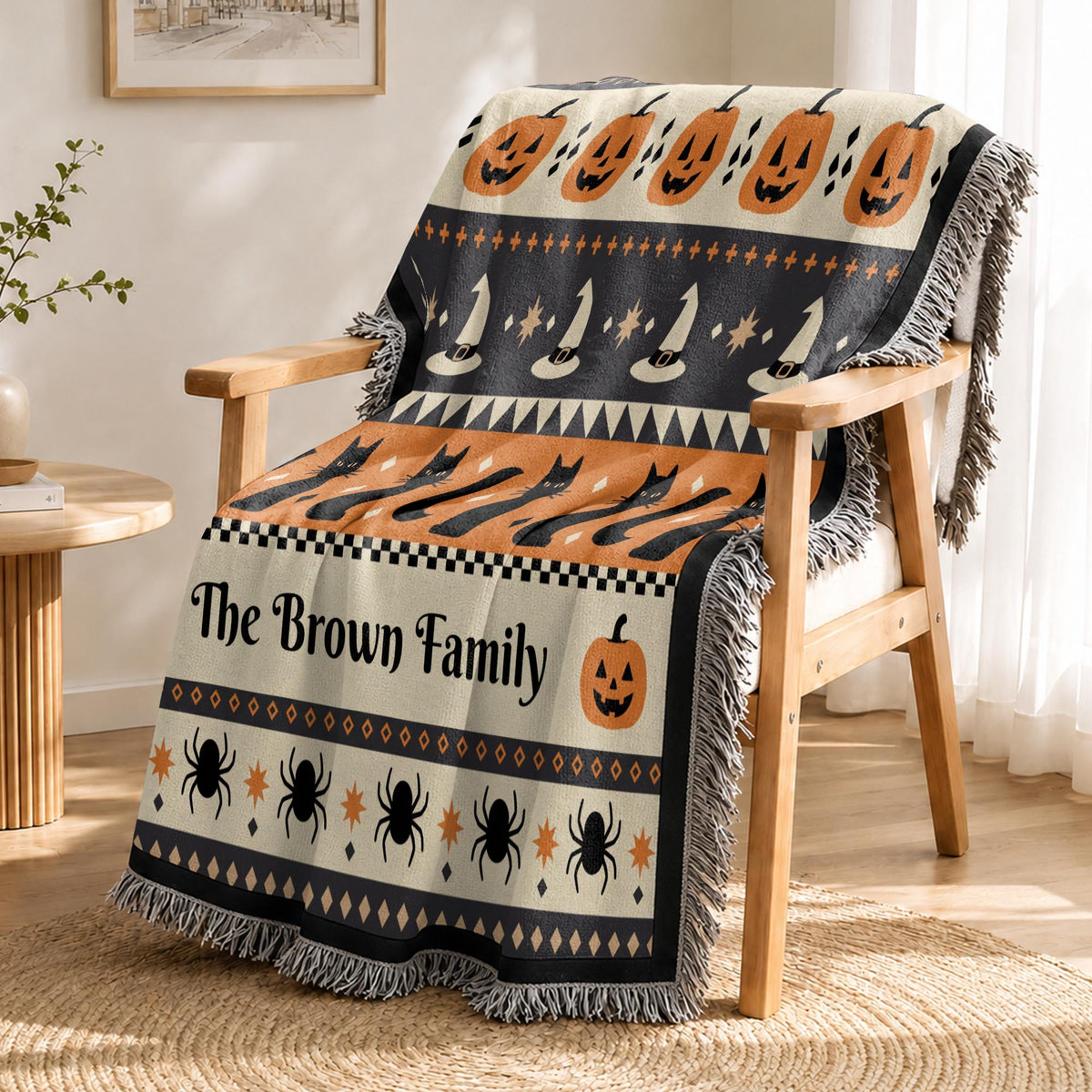 Folded personalized woven Halloween blanket showing size