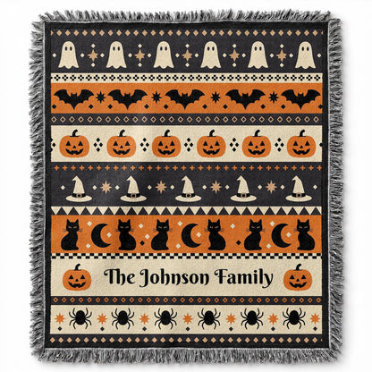 Personalized woven Halloween blanket draped over a chair