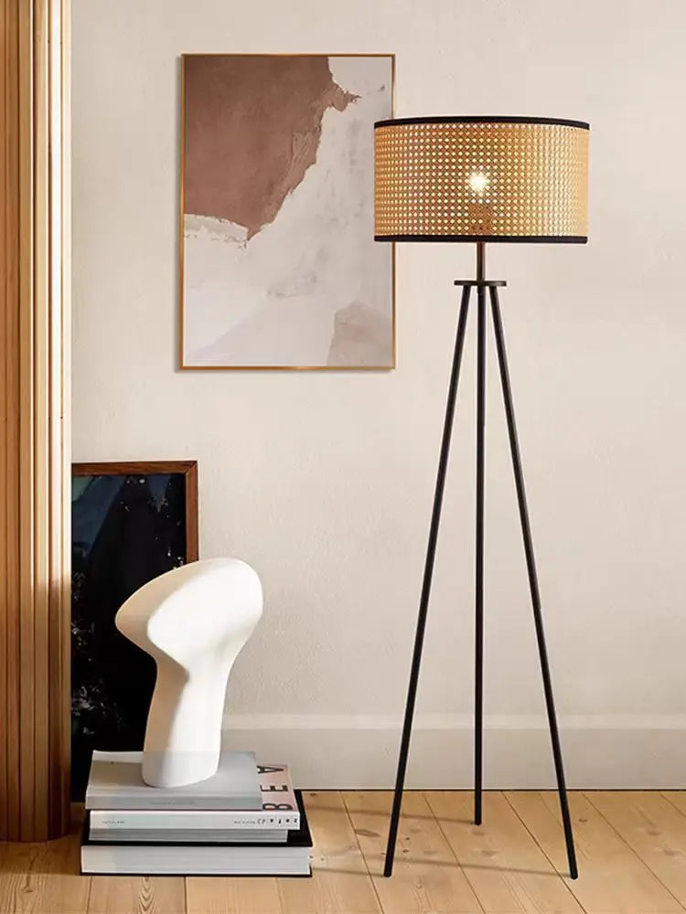 Rattan floor lamp shown in black and white finishes