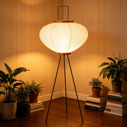 Rice paper floor lamp glowing in a bedroom setting