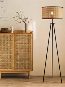 Rattan floor lamp with iron base, front view