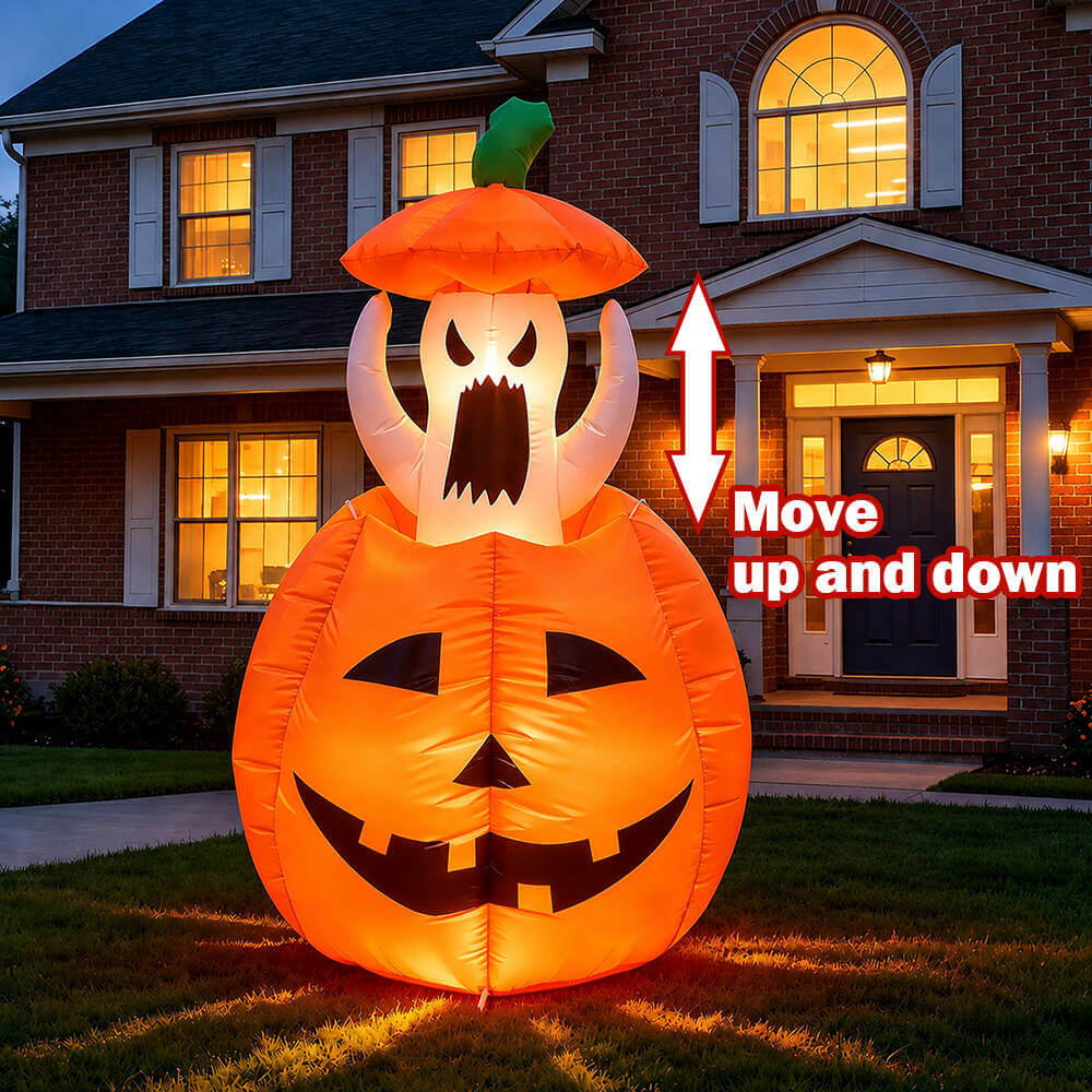 Animated LED ghost and pumpkin inflatable set up in a yard display