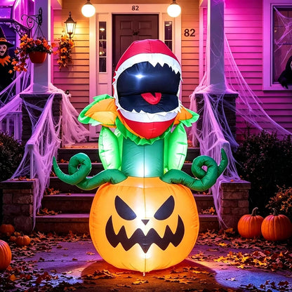 Carnivorous plant and pumpkin inflatable, close-up of the plant head