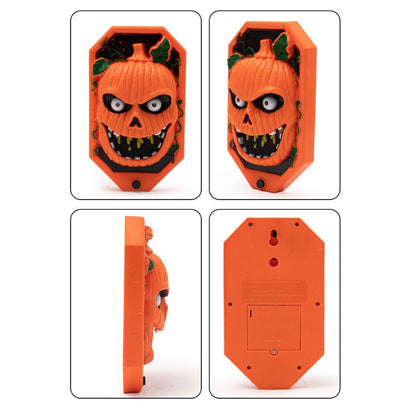 Halloween doorbell prop shown from the side with spider extended