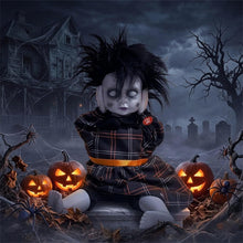 Seated horror doll Halloween prop with pale face and dark hair