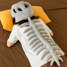 Gray plush dinosaur skeleton costume for children