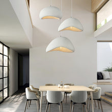 Moon dome pendant light glowing warm ambient light