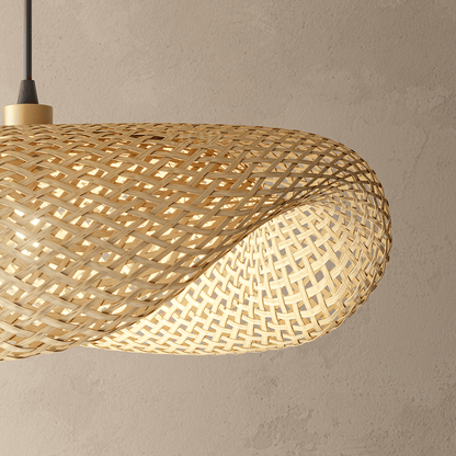 Amara bamboo chandelier hanging over a light, airy boho living room