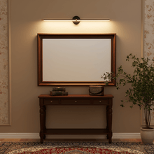 LED picture light installed above a bathroom vanity mirror