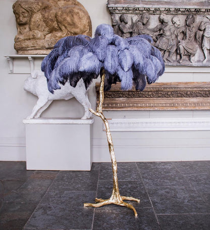 Close-up of hand-dyed ostrich feather plumes on the floor lamp canopy