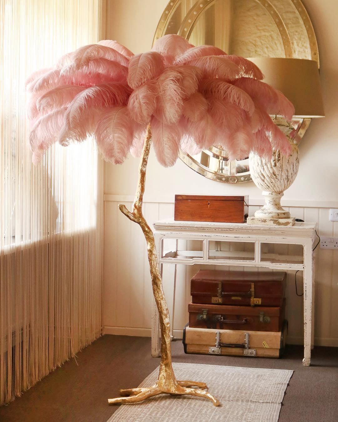 Ostrich feather floor lamp G9 light sources glowing through the feather canopy