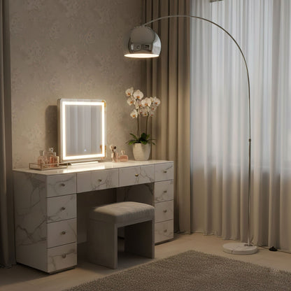 Sneedville floor lamp in a living room arcing over a sofa