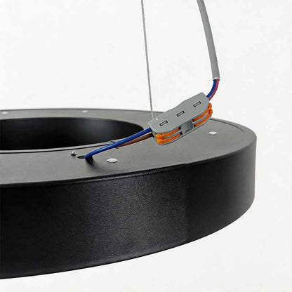 LED ring pendant light hanging at an adjustable height
