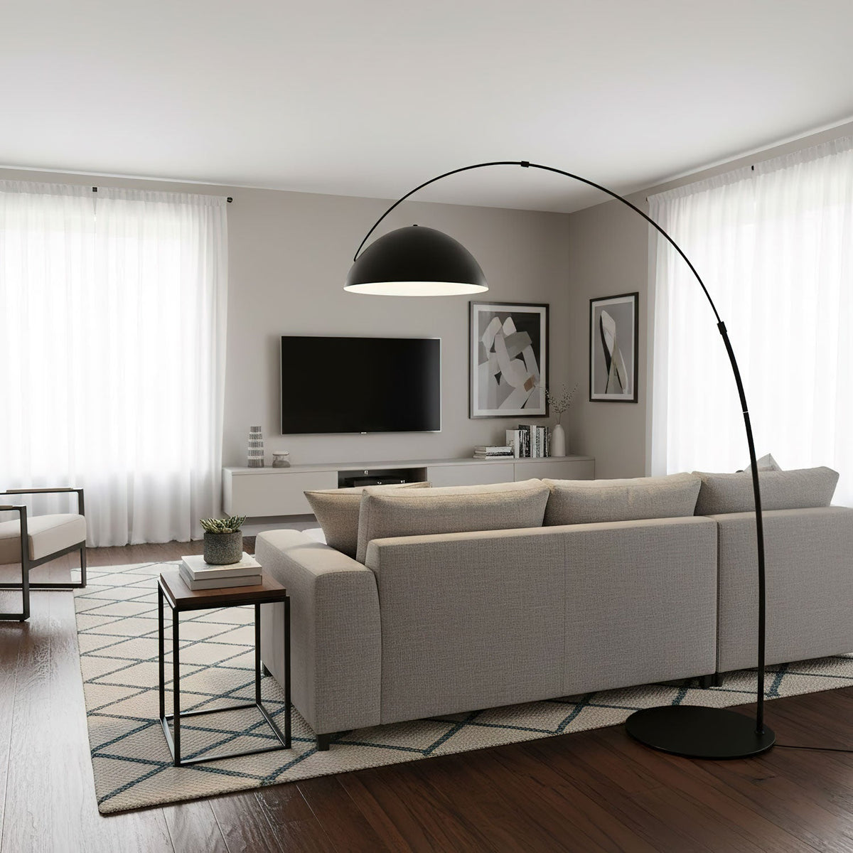Verse arc floor lamp beside a reading chair, shade angled downward