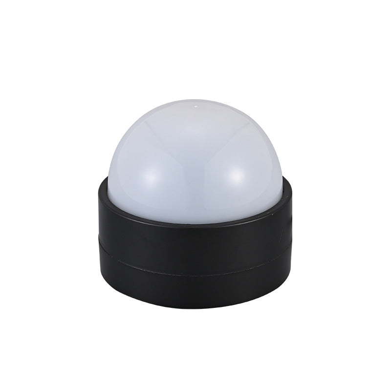 Projection lamp placed on a nightstand for bedroom ambiance