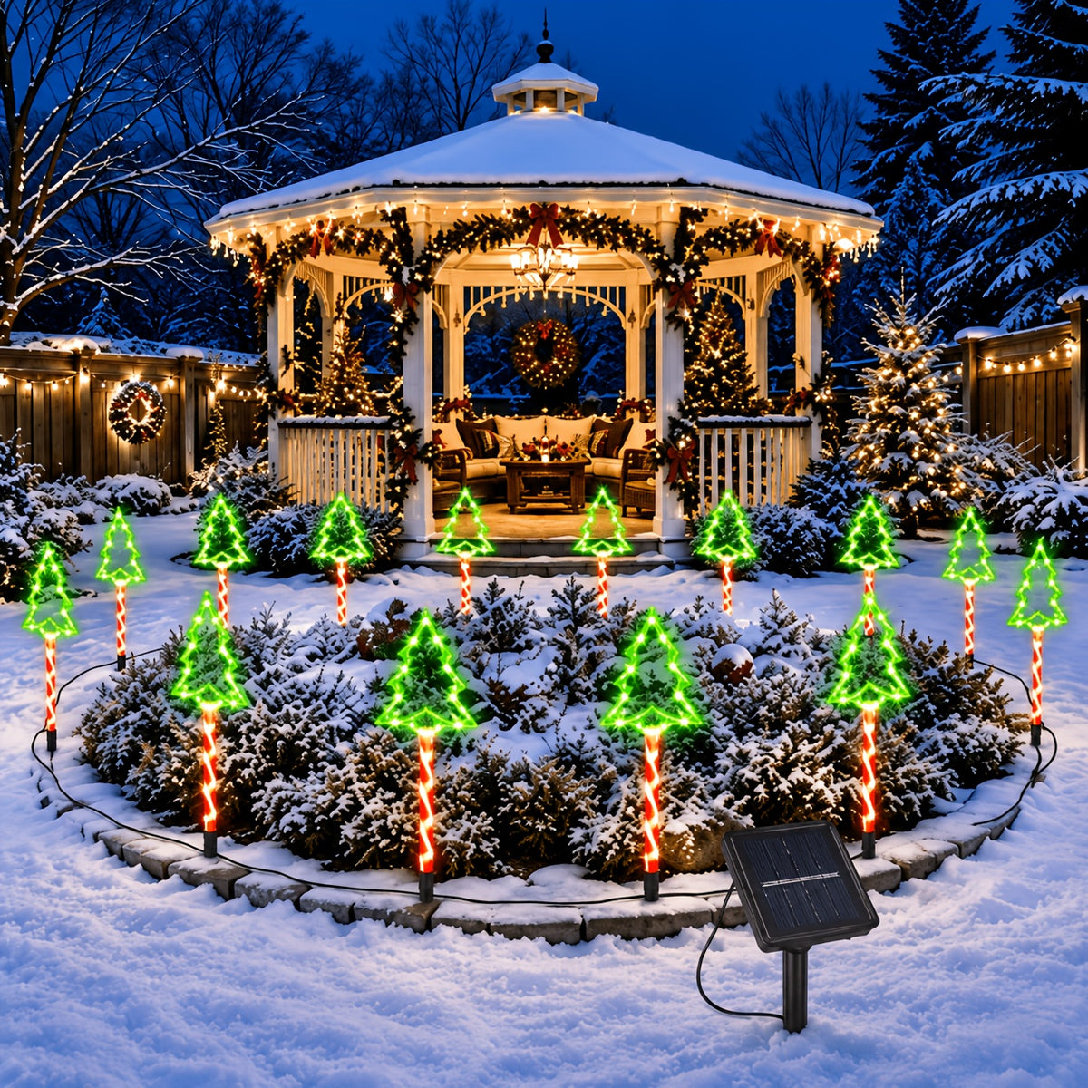 Eight pack of Christmas tree shaped solar stake lights
