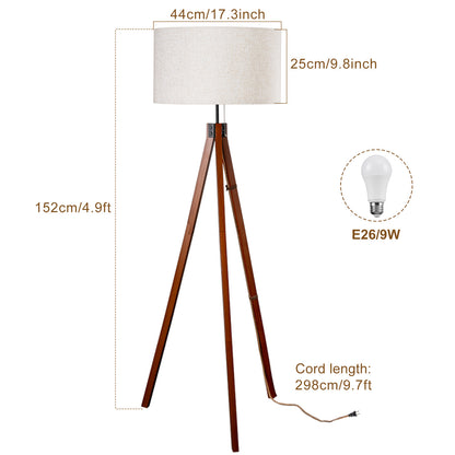 Tripod floor lamp styled in a living room corner