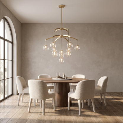 Adelina globe chandelier above a round walnut dining table