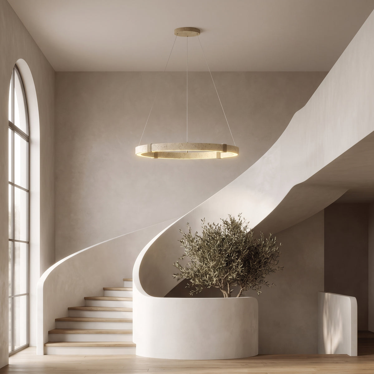 Torvi ring chandelier in a curved stairwell
