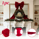 Close view of the red bow loops and the tasselled ribbon ends