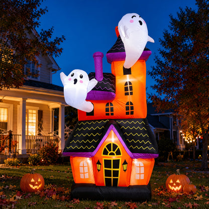 Large inflatable haunted house ghost castle decoration lit up in a yard - view 9