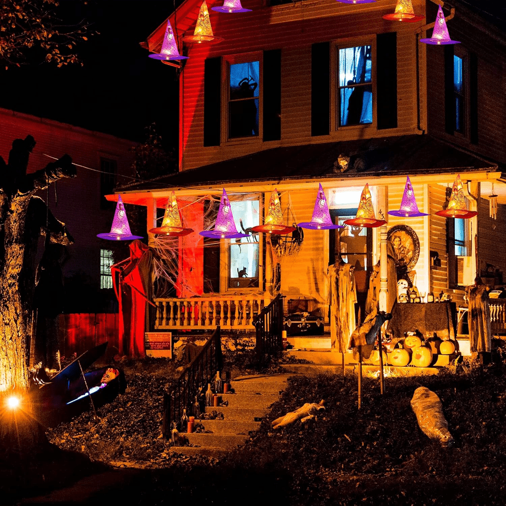 Light-up witch hat string light set, six hats in orange and purple on one LED light string