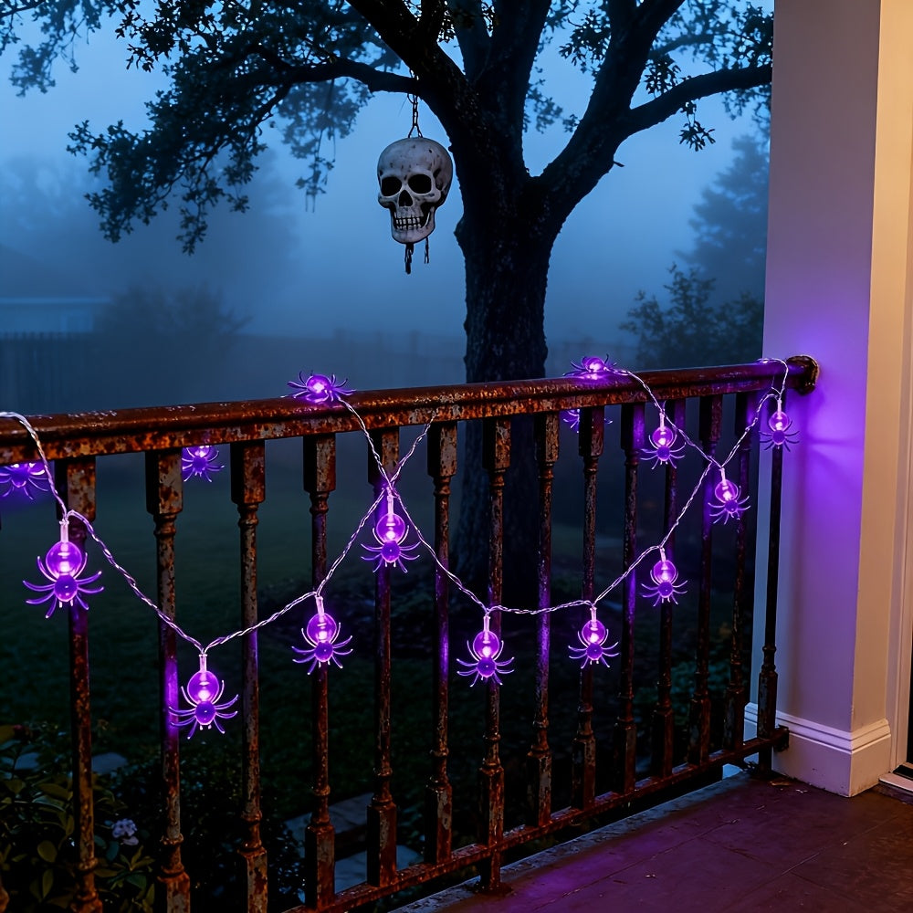 Purple spider Halloween LED light hanging from a cord