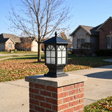 Birchwood arched window post light on a brick driveway pillar on a clear late-autumn day