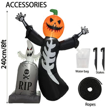 Pumpkin skull tombstone inflatable lit up at night