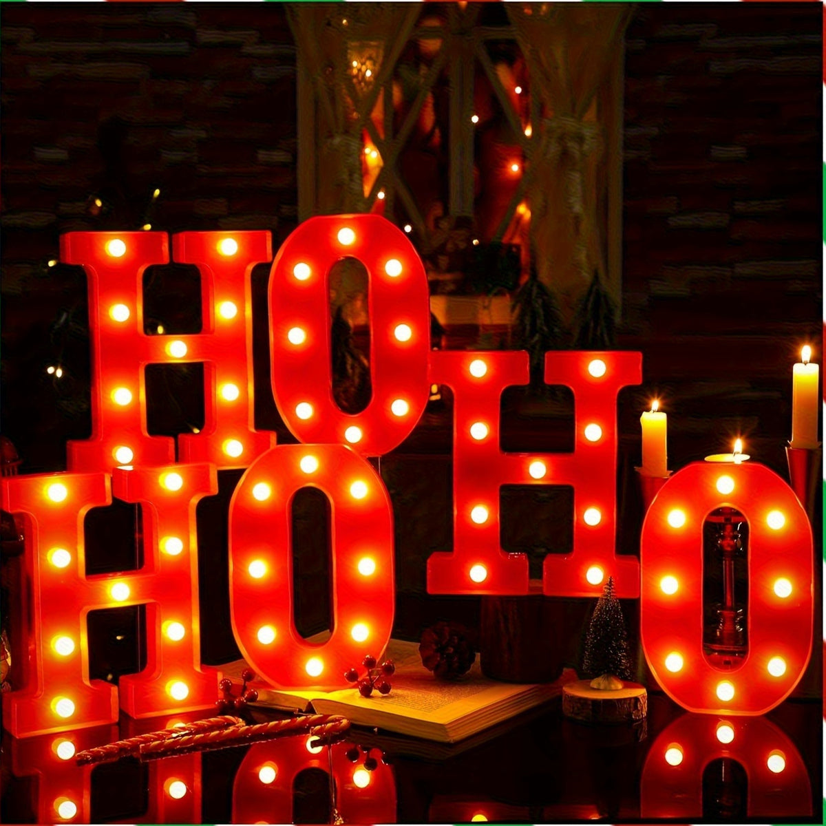 Red plastic light up letters spelling Ho Ho Ho for Christmas