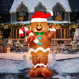 Candy cane gingerbread man inflatable for a Christmas display