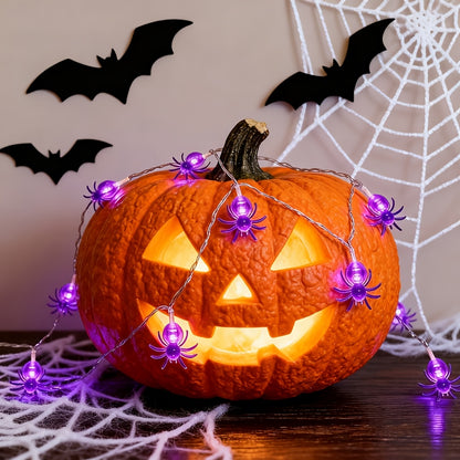 Purple spider Halloween LED light displayed in a haunted house scene