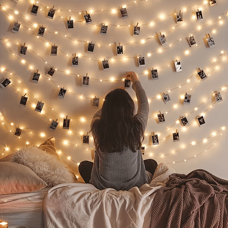 Photo wall lights arranged on a bedroom wall