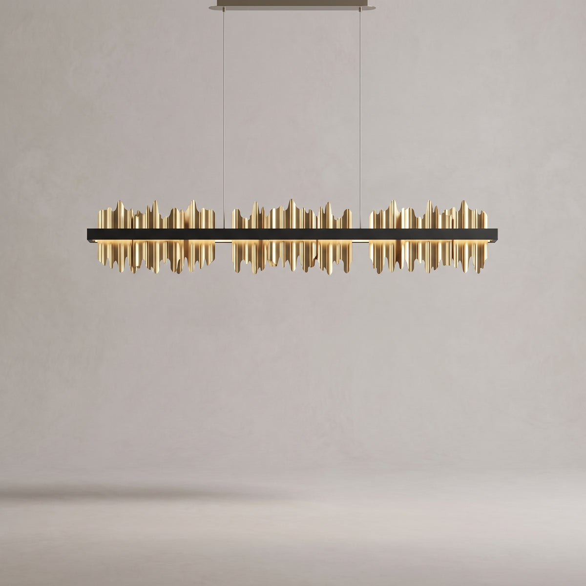 Cascade linear chandelier on a warm light grey studio background