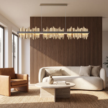 Cascade linear chandelier with polished gold plates in a warm living room