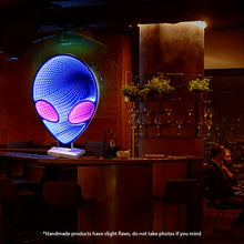 Close-up of the infinity mirror LED tunnel effect inside the alien lamp