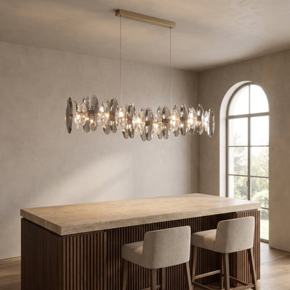 Celestial crystal pendant light above a walnut kitchen island