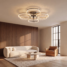 Corvina gold aluminum ring ceiling light with six rings in a living room with walnut slat wall
