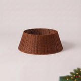 Brown woven calabash grass tree collar, studio photo