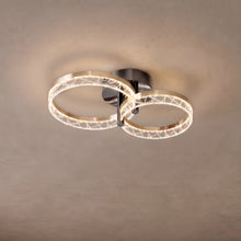 Corvina ceiling light close-up with 2 crystal-textured rings